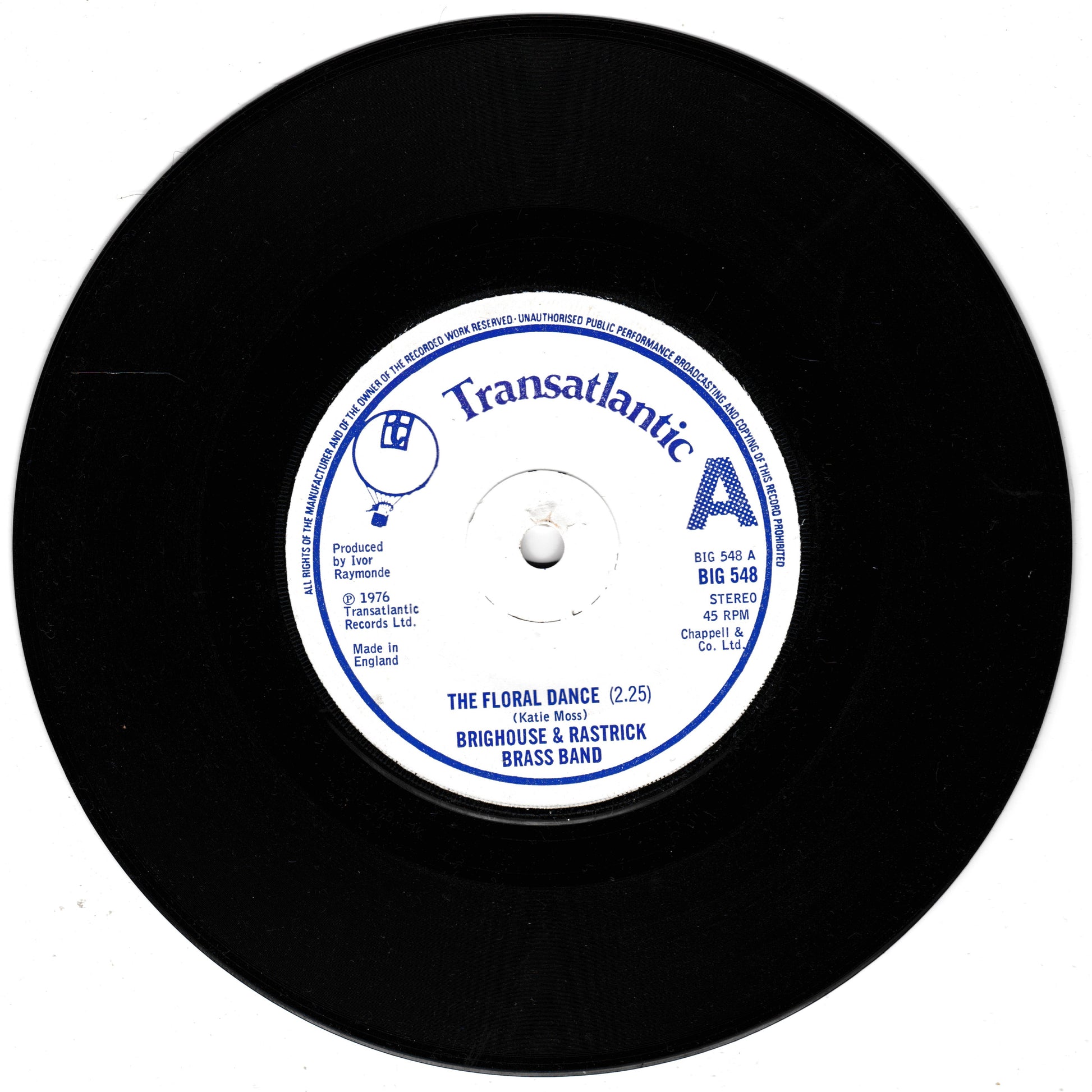 Black vinyl record with a white label featuring 'Transatlantic' and 'The Floral Dance' by Broughouse & Rastrick Brass Band.