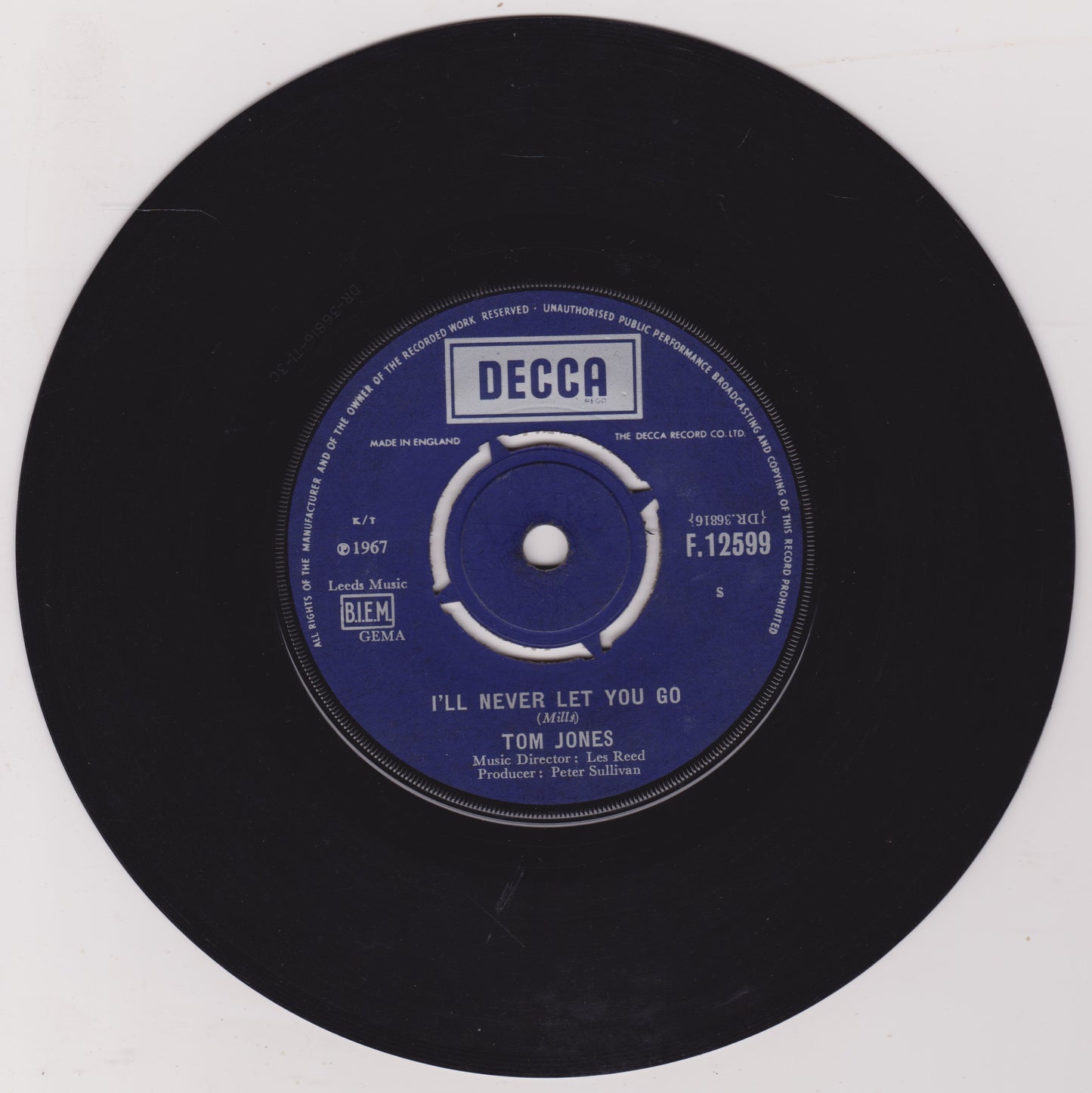 Black vinyl record with a blue label featuring 'Decca' branding and text.