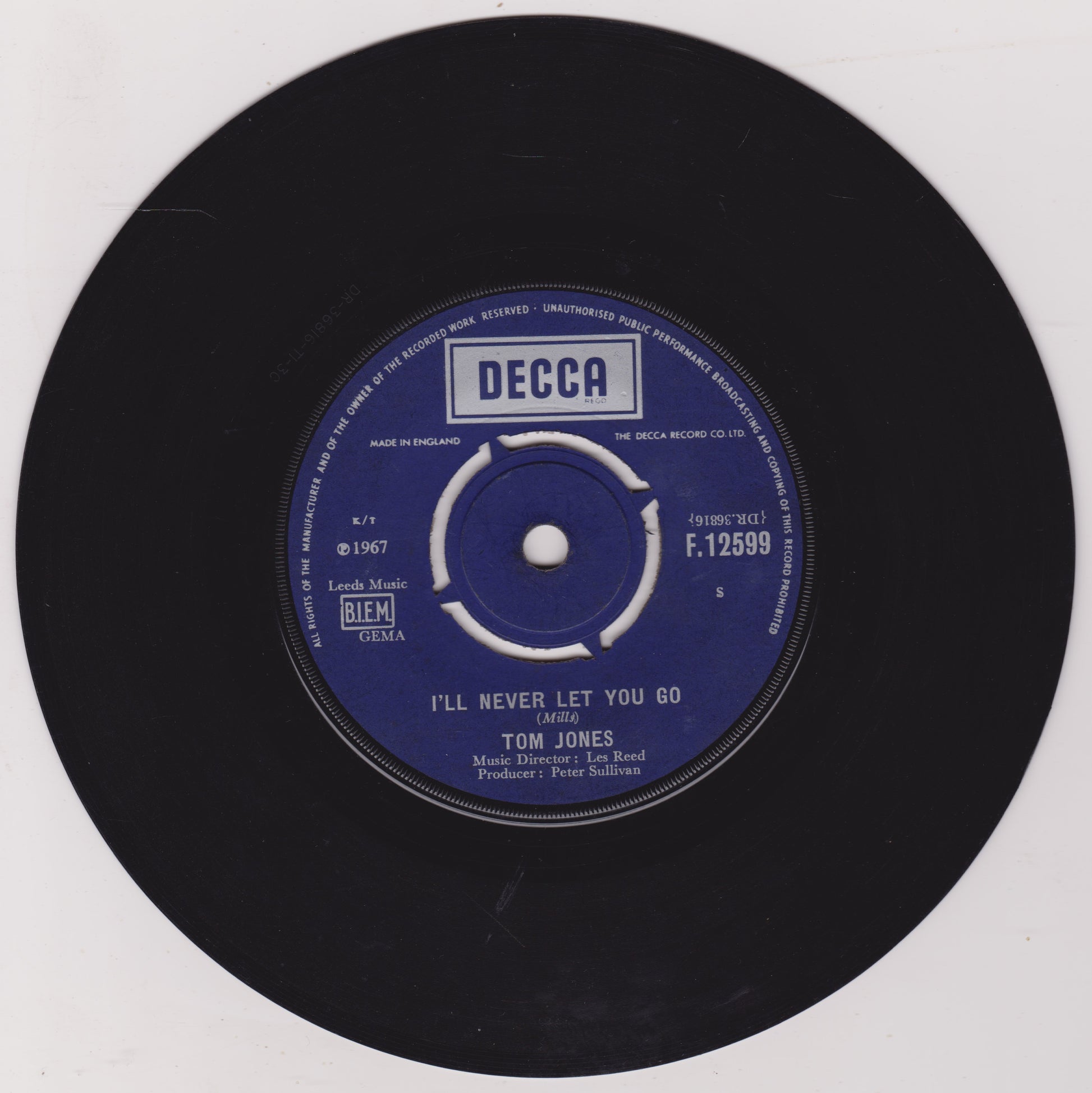 Black vinyl record with a blue label featuring 'Decca' branding and text.
