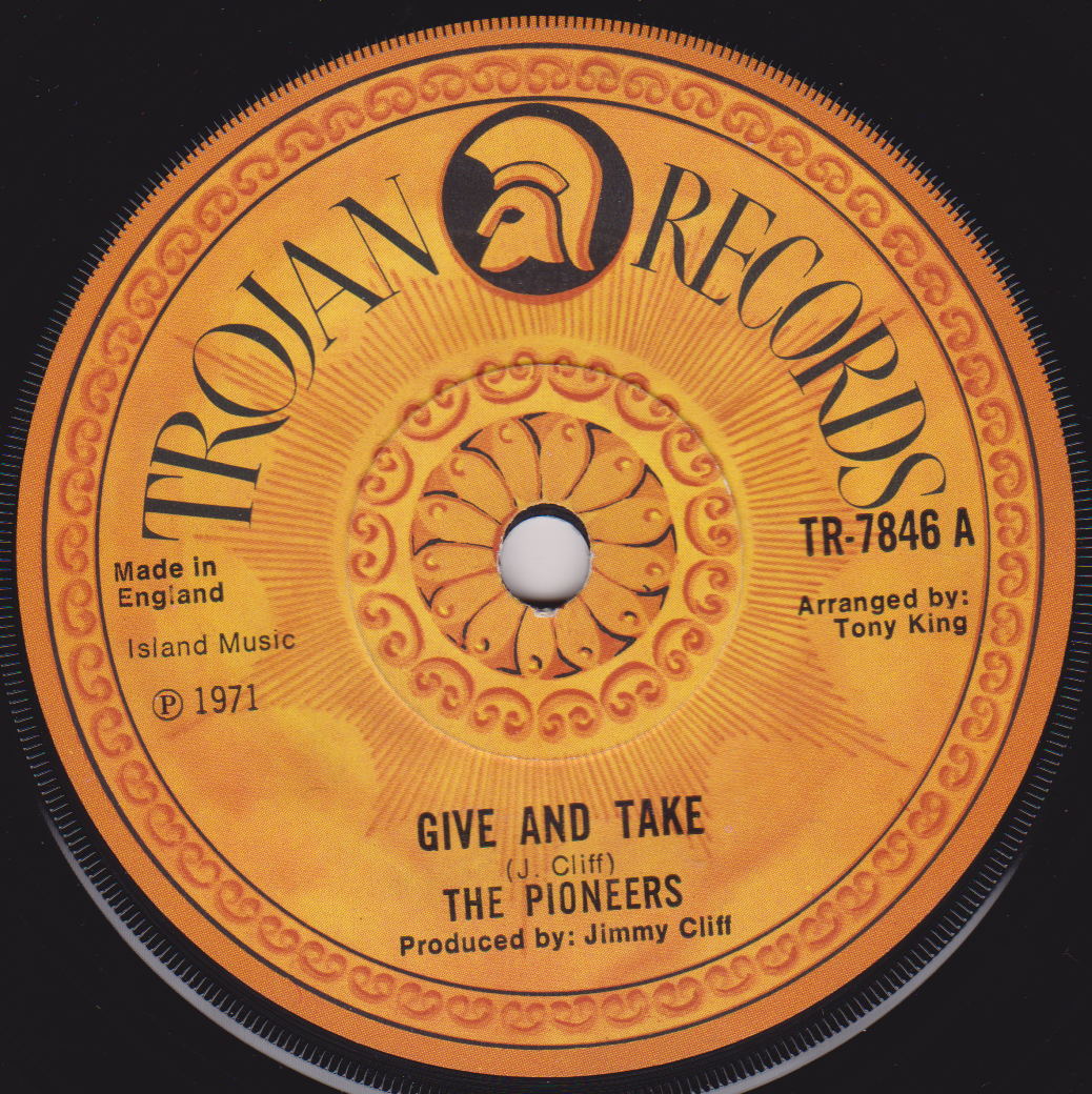 A 7-inch vinyl record label for 'Give And Take' by The Pioneers, produced by Jimmy Cliff, with the Trojan Records logo.