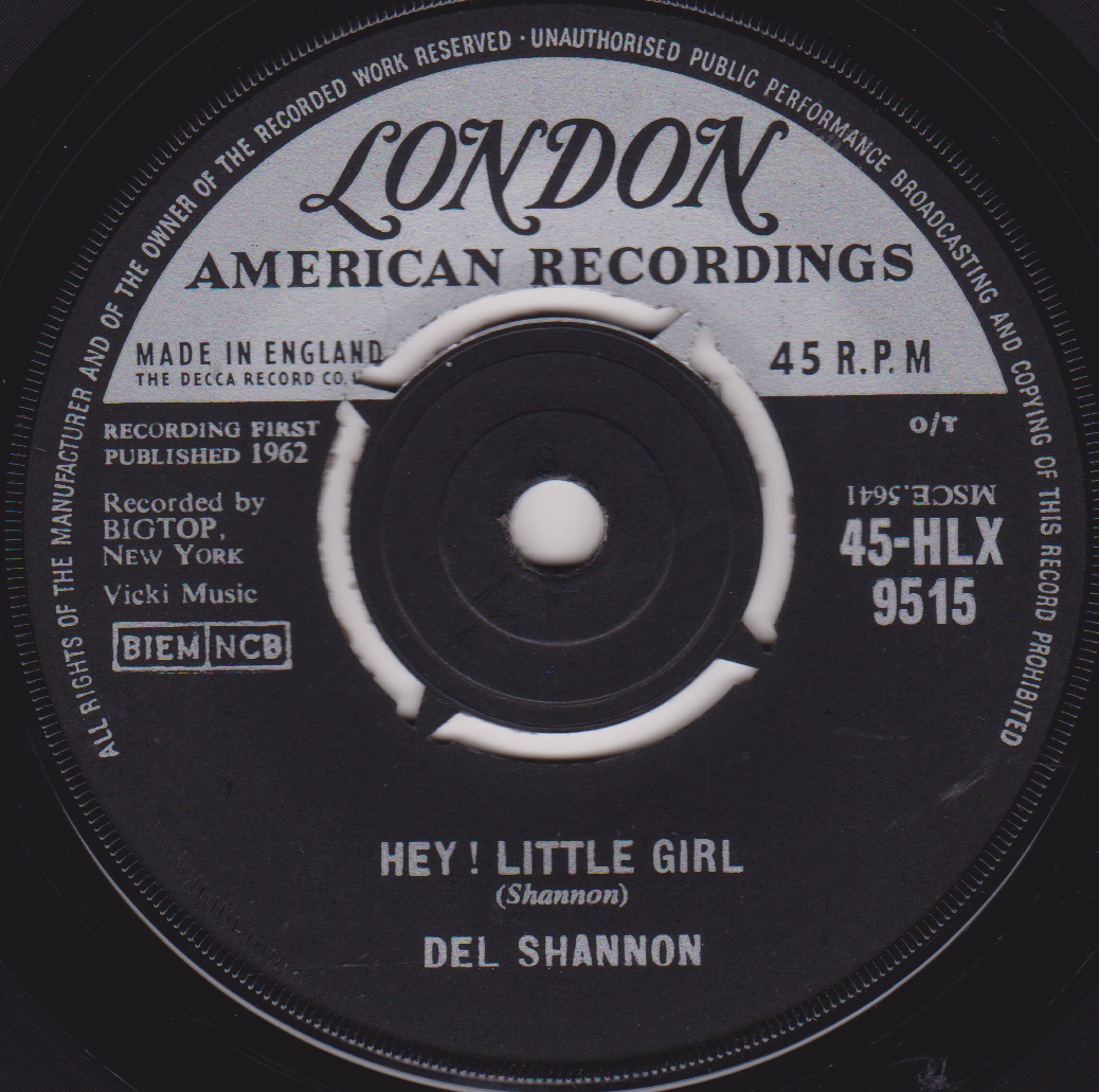 Record label for a 45 RPM record by Del Shannon titled 'Hey! Little Girl'.