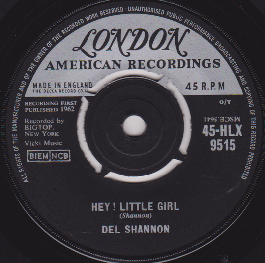 Record label for a 45 RPM record by Del Shannon titled 'Hey! Little Girl'.