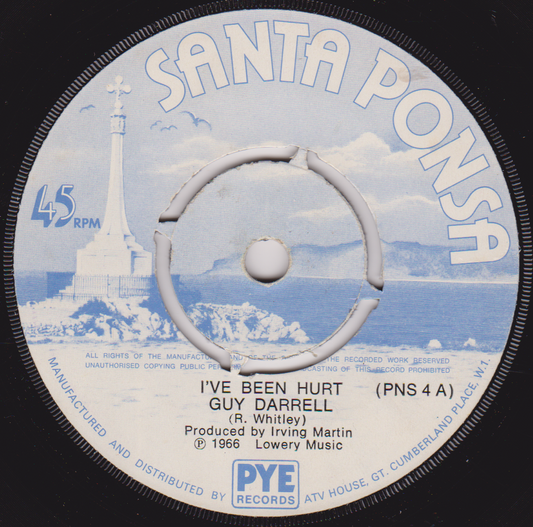 Record label for 'I've Been Hurt' by Guy Darrell with a lighthouse illustration on a blue background.