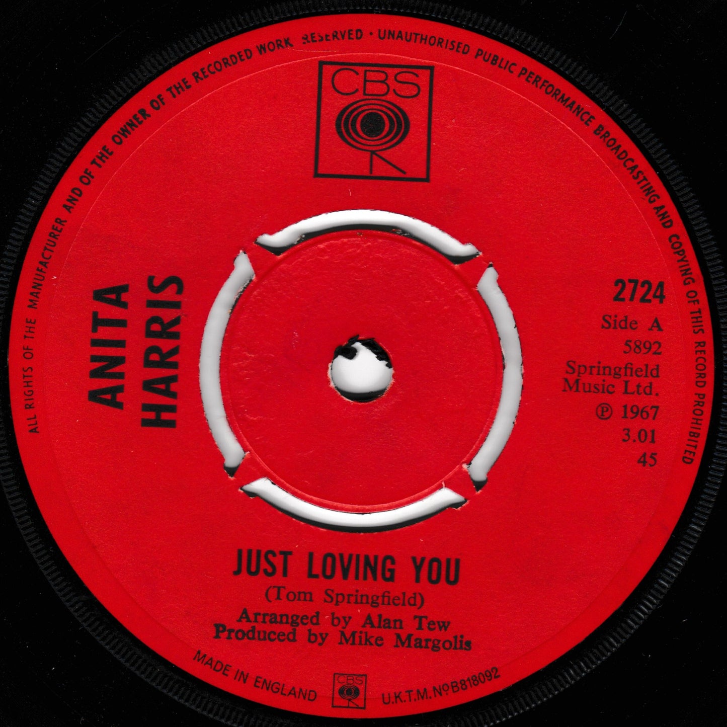 Red vinyl record label with text and a CBS logo