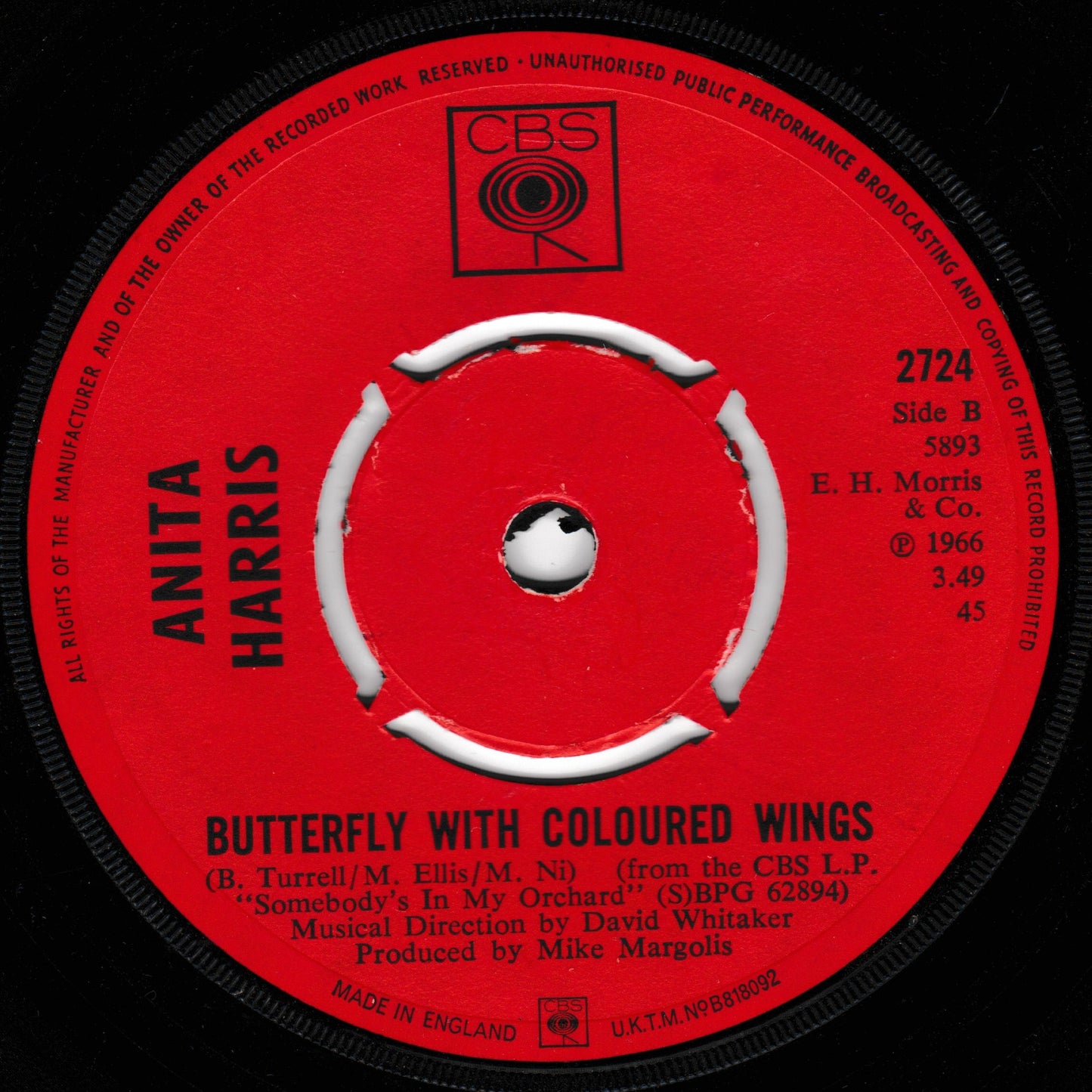 Record label with 'Anita Harris' and 'Butterfly with Coloured Wings' text on a red background