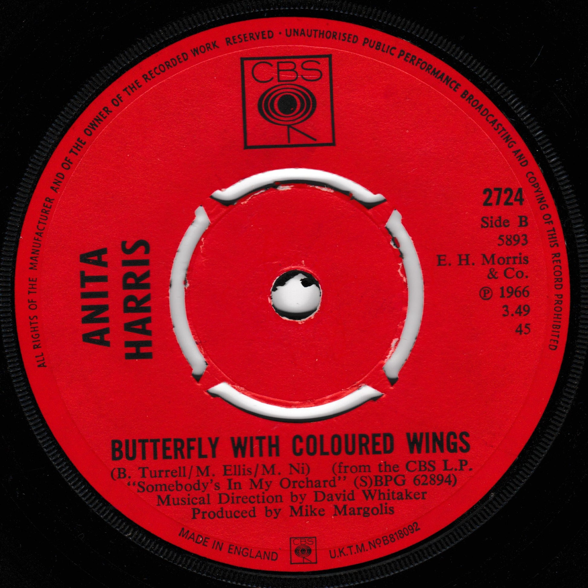 Record label with 'Anita Harris' and 'Butterfly with Coloured Wings' text on a red background