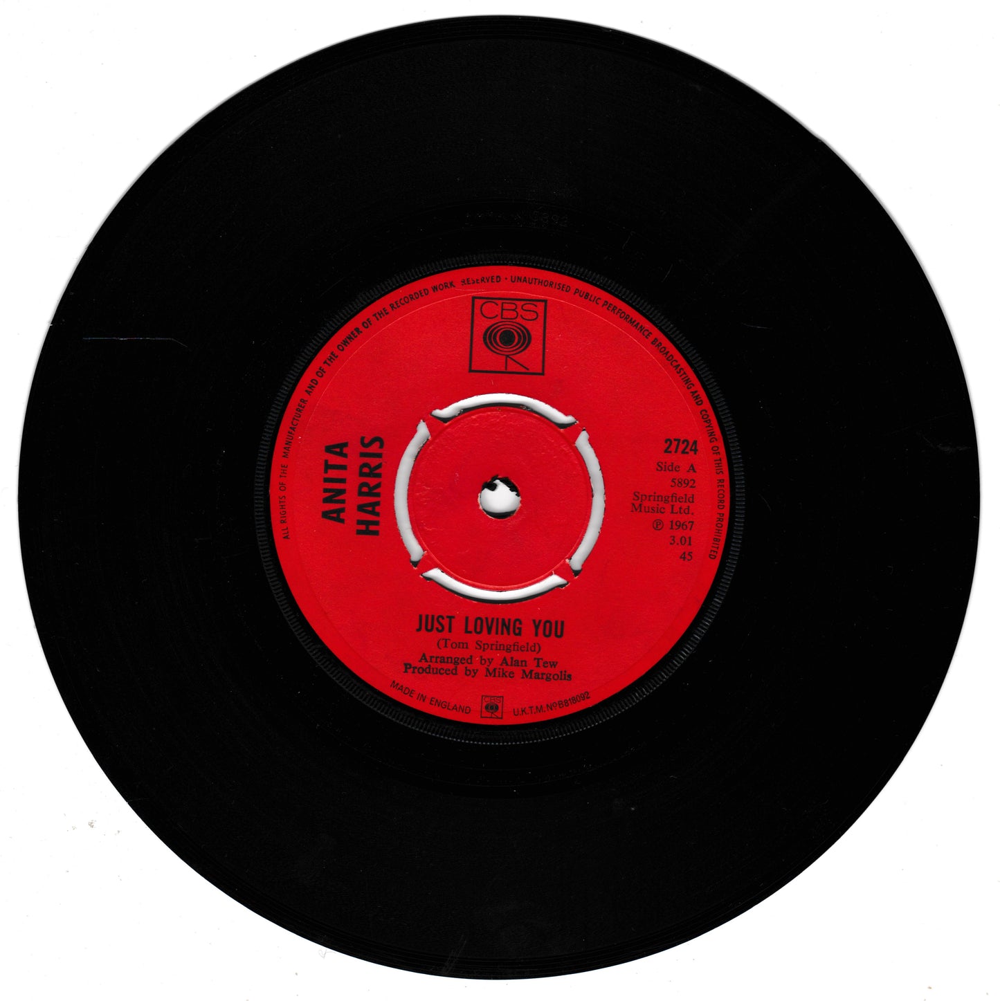 Black vinyl record with a red label featuring 'Anita Harris' and 'Just Loving You'.