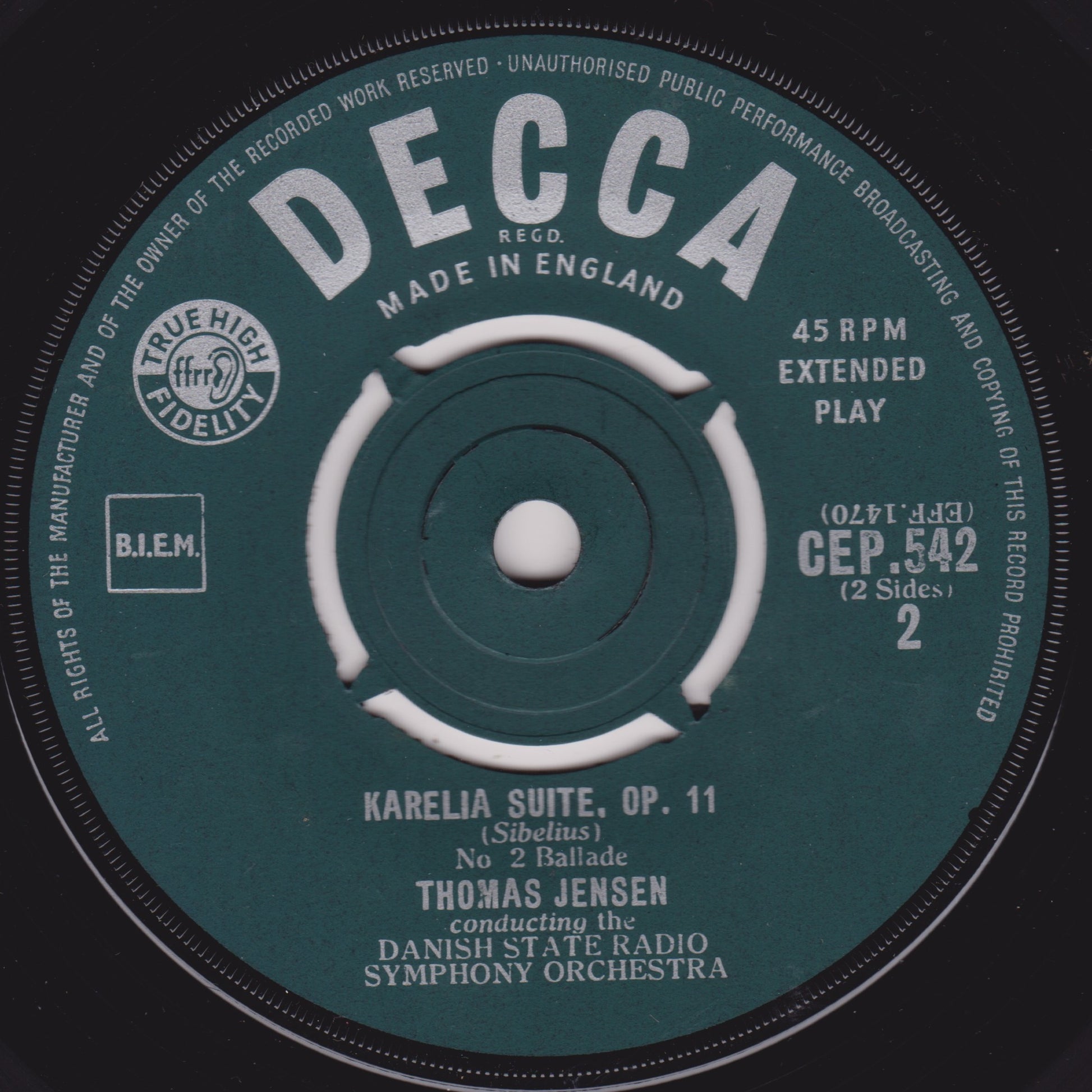 Decca record label with text and branding on a dark background