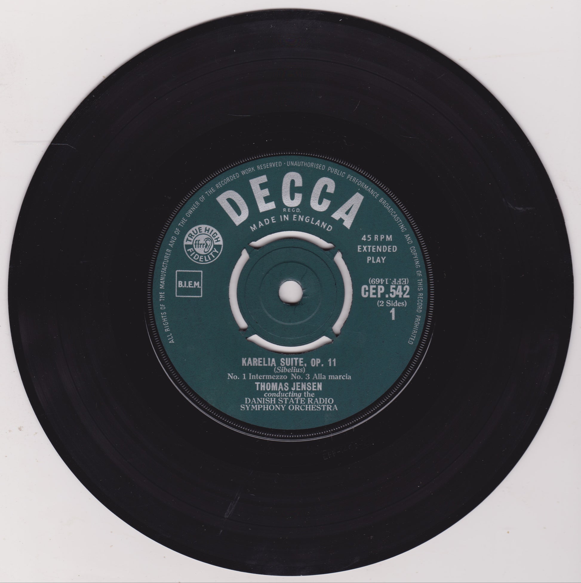 Black vinyl record with a Decca label on a white background