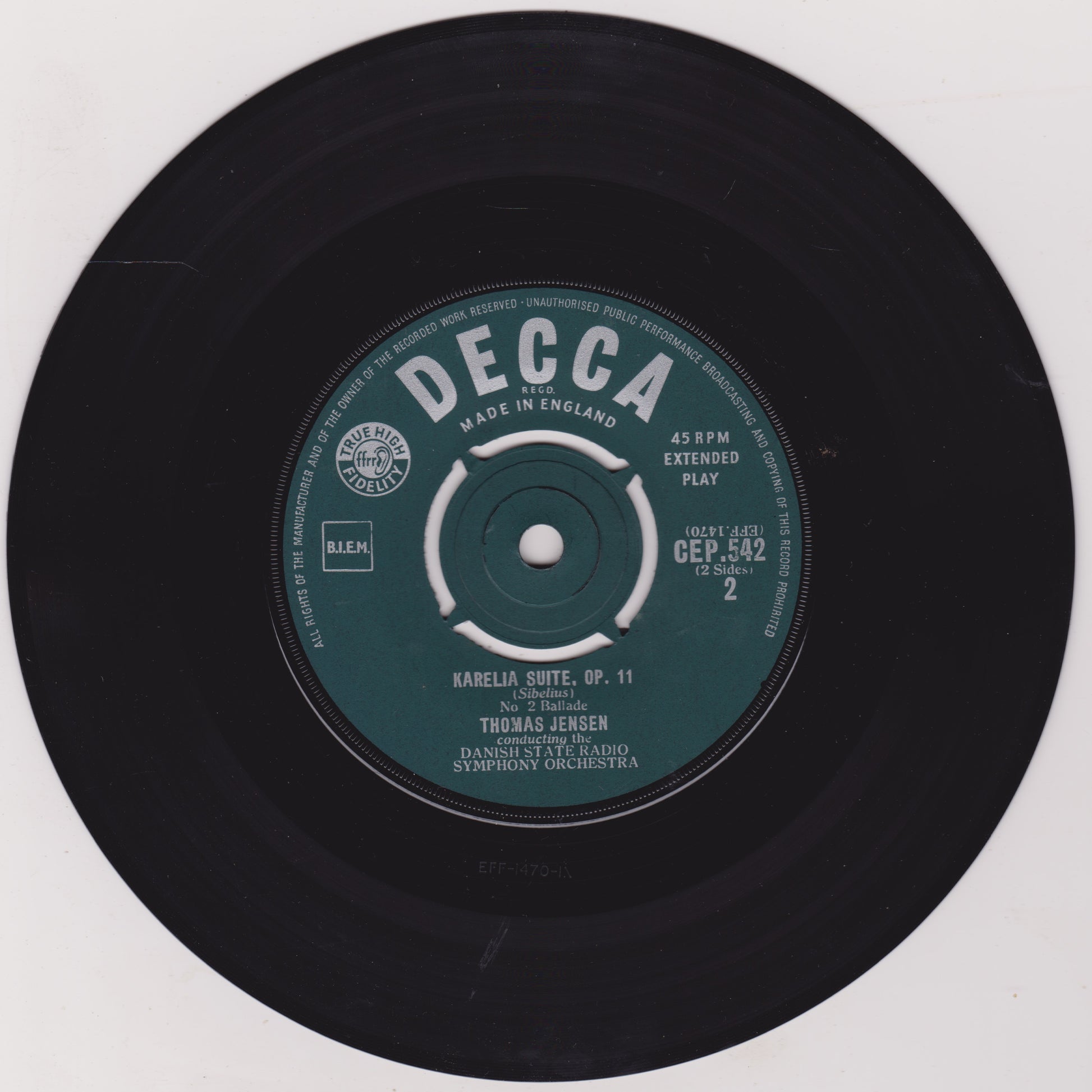 Black vinyl record with a Decca label on a white background