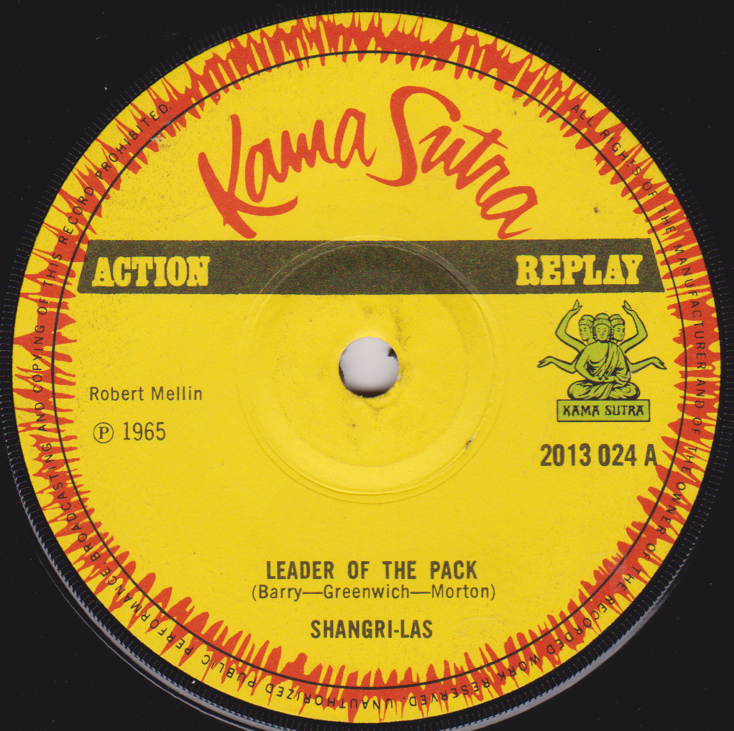 Record label from a Kama Sutra single with yellow center and red and black border