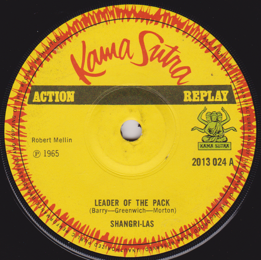 Record label from a Kama Sutra single with yellow center and red and black border