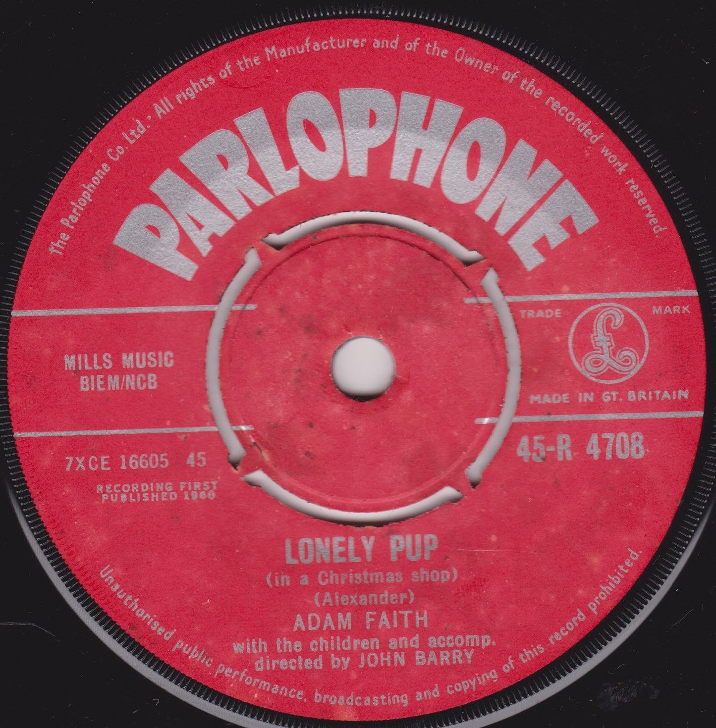 Parlophone record label with 'Lonely Pup' by Adam Faith on a black background