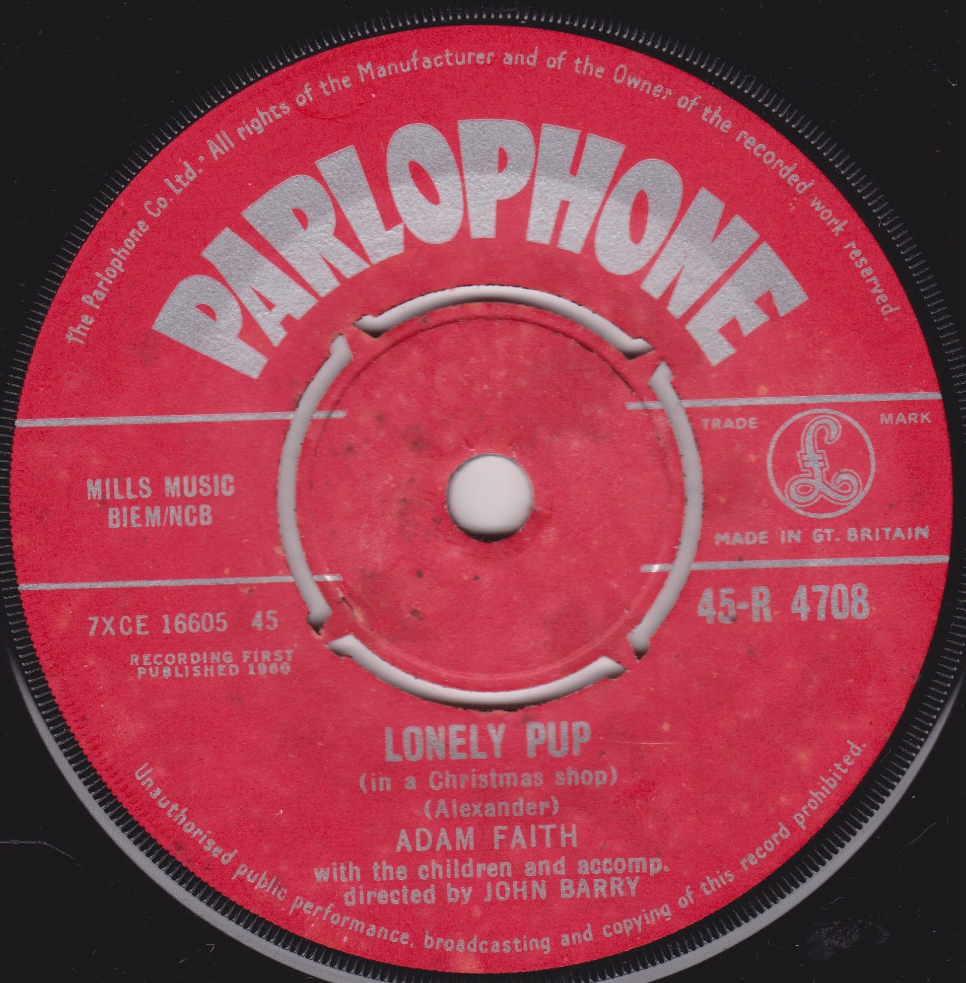 Parlophone record label with 'Lonely Pup' by Adam Faith on a black background