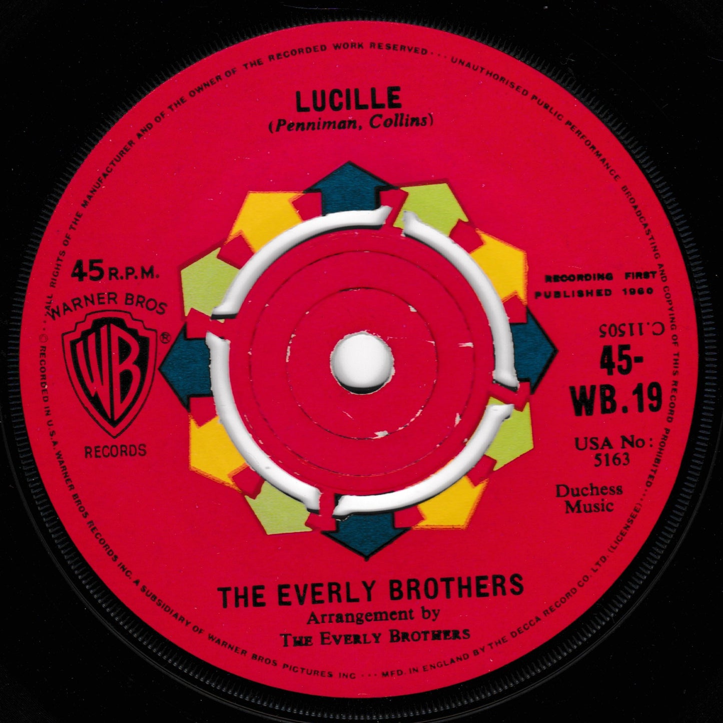 A vintage 45 rpm vinyl record label for 'Lucille' by The Everly Brothers, featuring a bright red centre with black outer ring, geometric yellow and green accents, and Warner Bros. Records branding.
