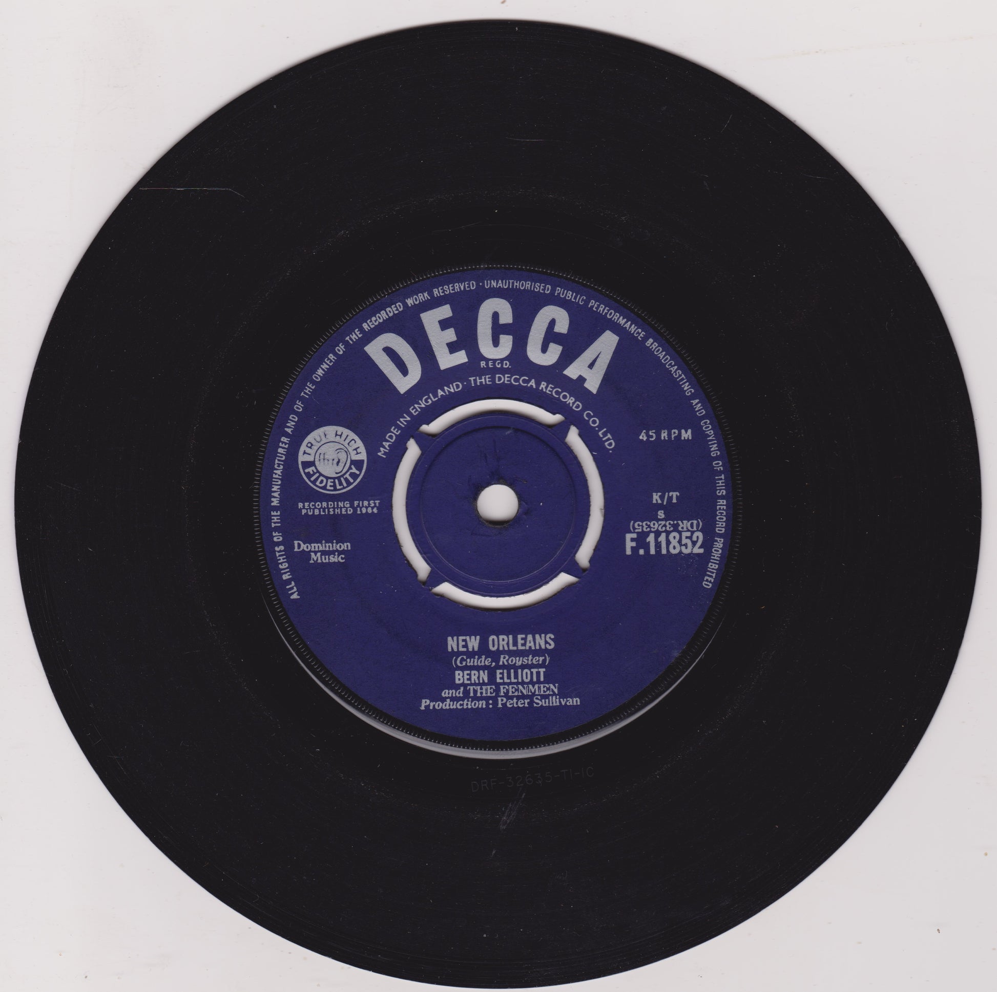 Black vinyl record with a blue label featuring 'Decca' branding on a white background