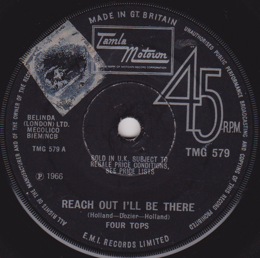 Record label with text and branding on a black background