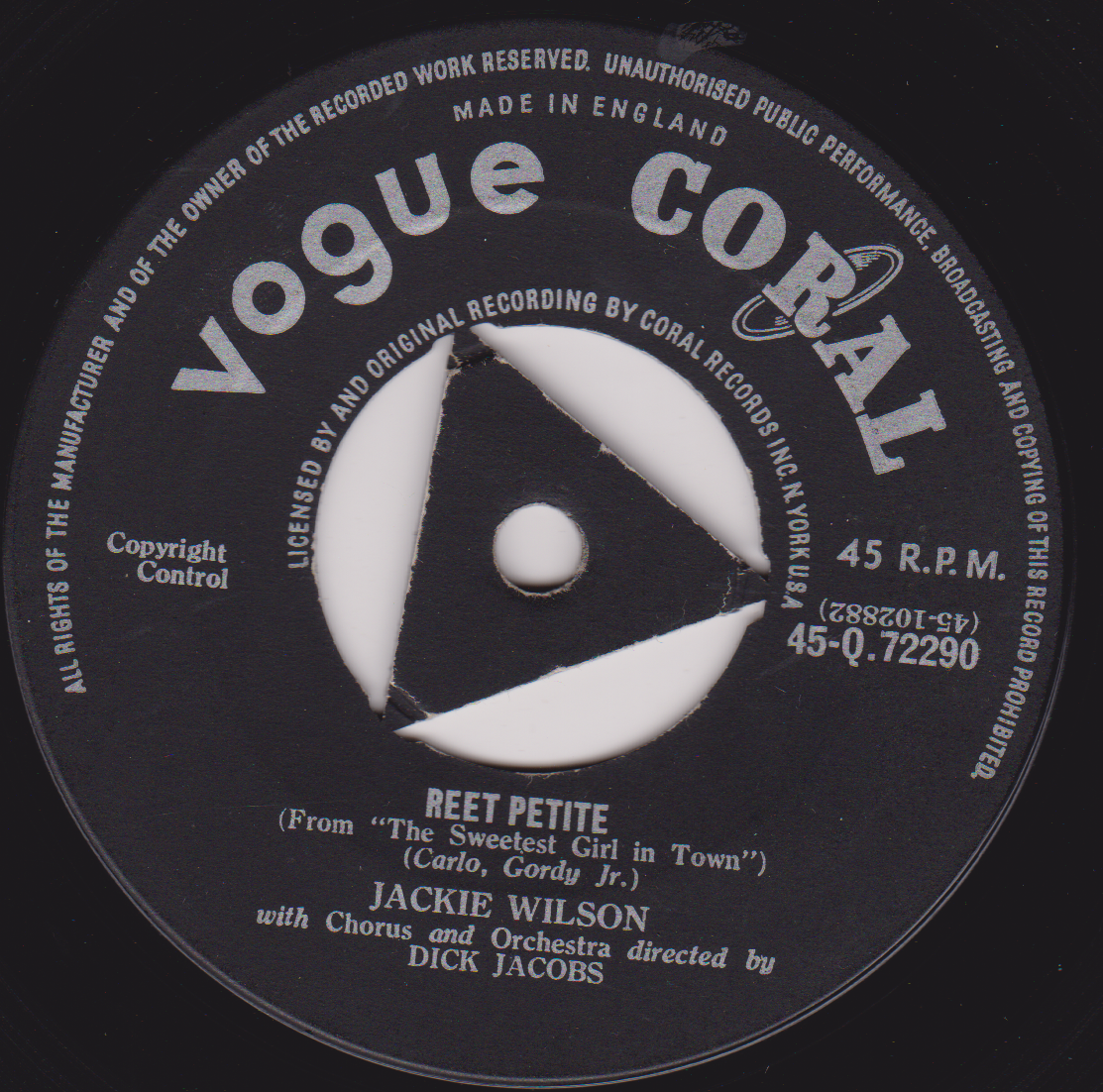 Vogue Coral record label with text and a white triangle design on a black background