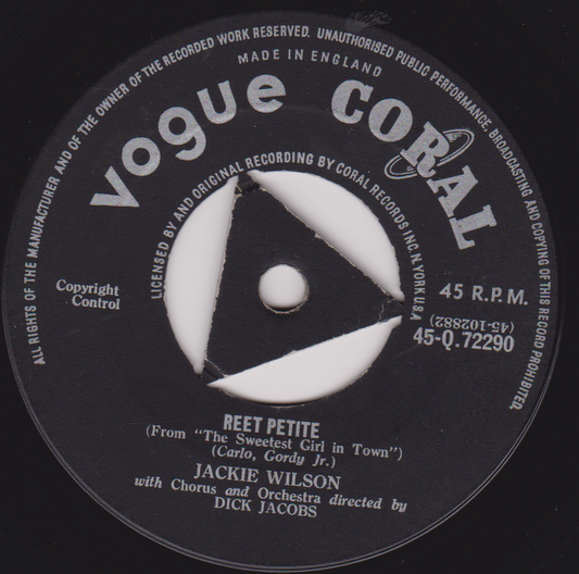 Vogue Coral record label with text and a white triangle design on a black background
