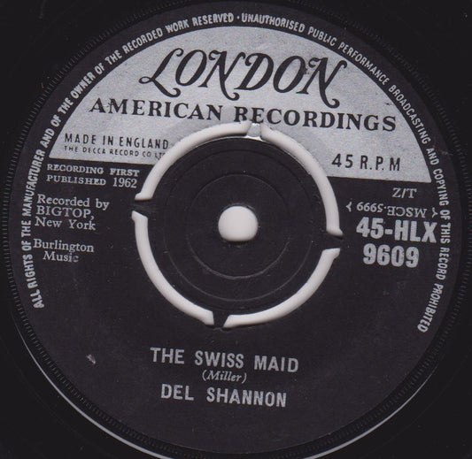 A 7-inch vinyl record label for Del Shannon - The Swiss Maid, showing the record details and the name of the artist.