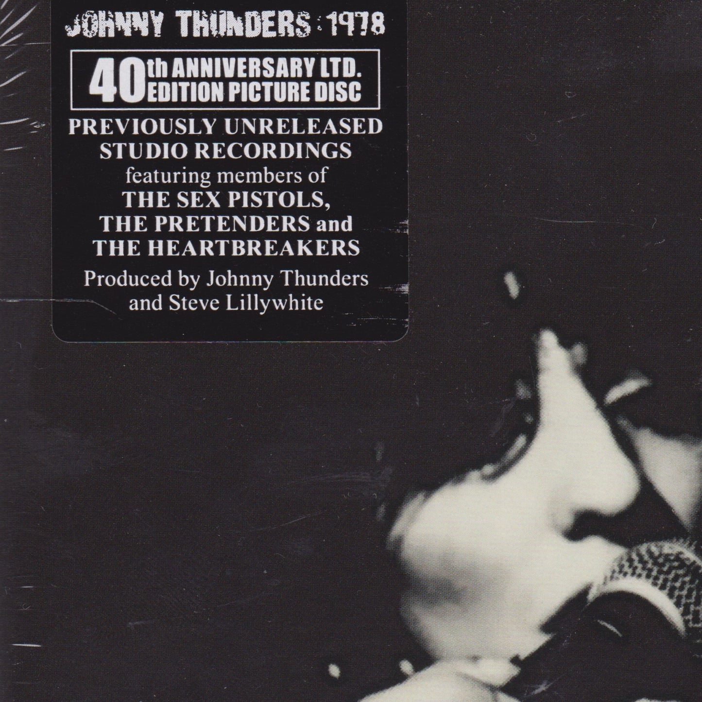 Single cover for Johnny Thunders 1978 with text about unreleased studio recordings featuring members of The Sex Pistols, The Pretenders, and The Heartbreakers.