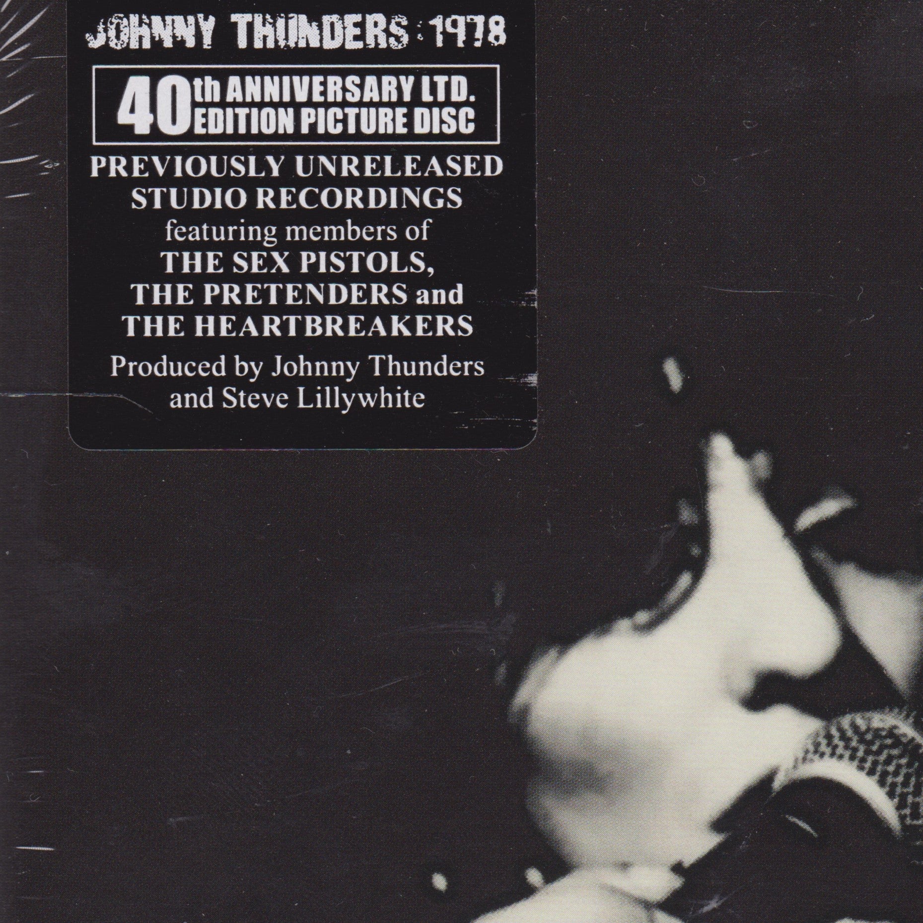 Single cover for Johnny Thunders 1978 with text about unreleased studio recordings featuring members of The Sex Pistols, The Pretenders, and The Heartbreakers.