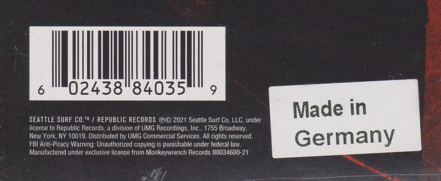 Back of a product with a barcode and 'Made in Germany' label on a black background