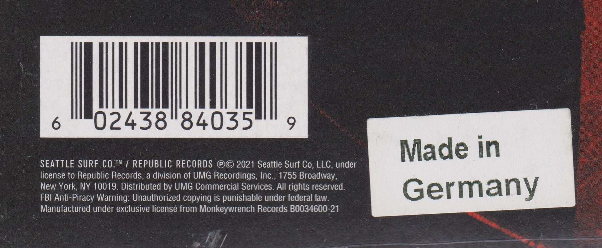 Back of a product with a barcode and 'Made in Germany' label on a black background