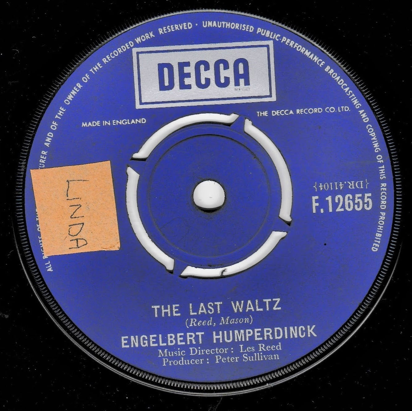 A vintage blue Decca 7-inch vinyl record for Engelbert Humperdinck's 'The Last Waltz', featuring a handwritten orange 'LINDA' sticker on the left side, set against a black background.