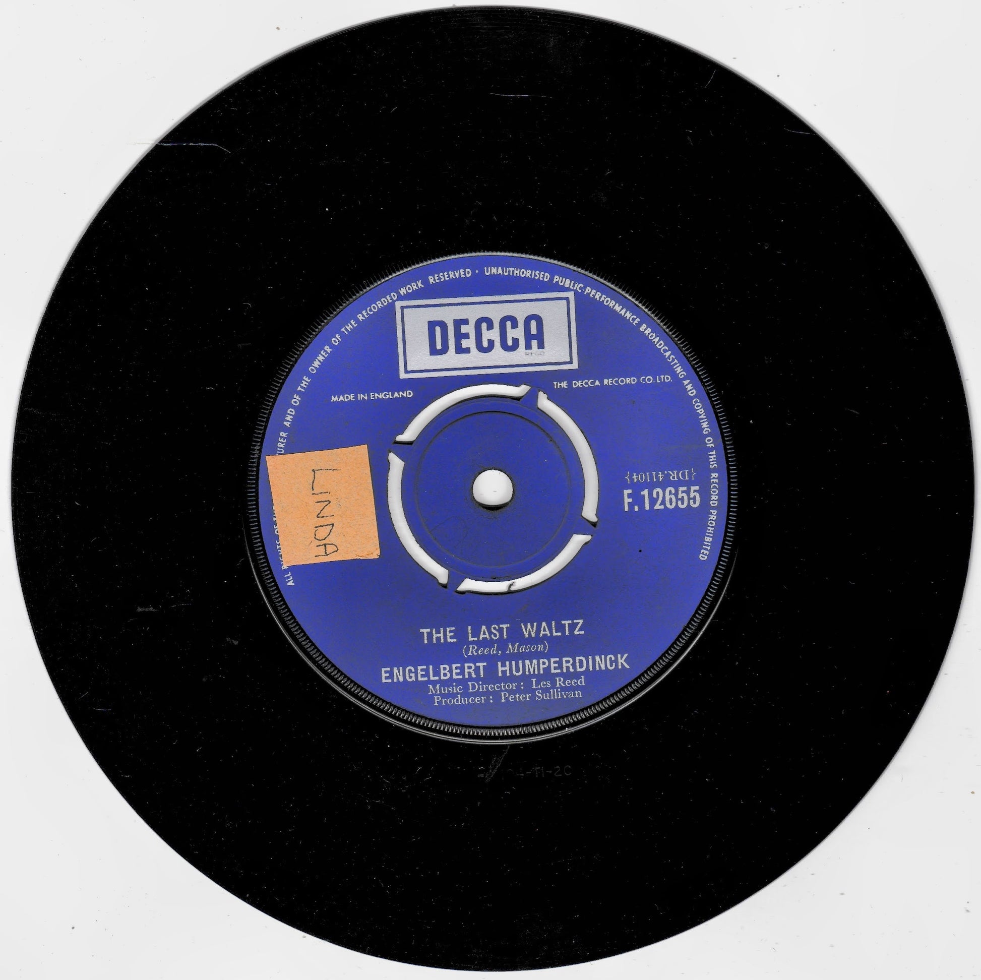 A black vinyl record with a blue and white Decca label, featuring the song 'The Last Waltz' by Engelbert Humperdinck. A small orange handwritten sticker is visible on the left side of the label.