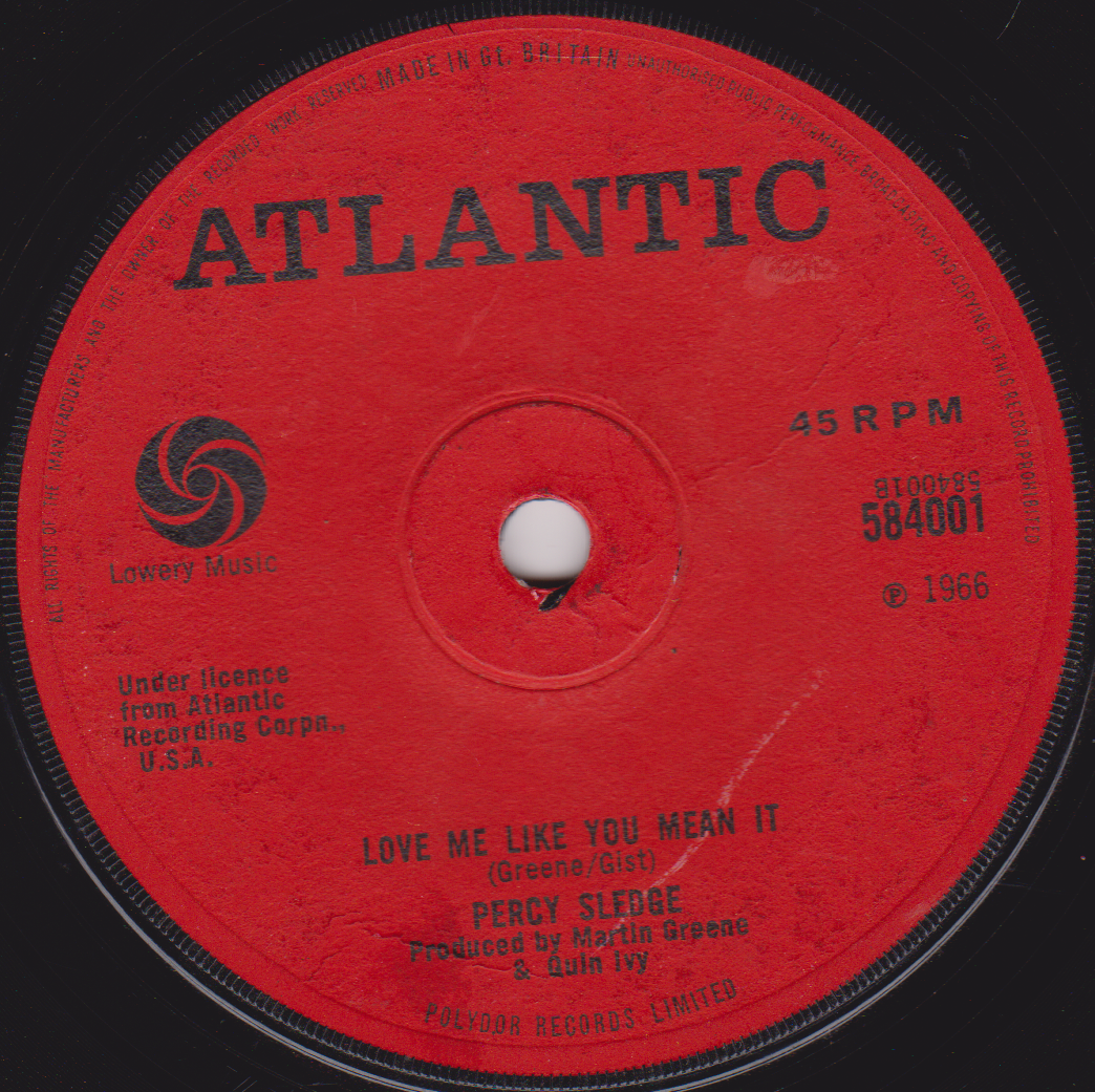 Red vinyl record label with 'Atlantic' branding and text